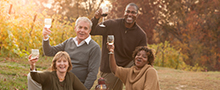 Group-of-middle-aged-people-toasting-to-success